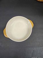 Top view of one bowl showing interior and handle color