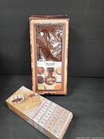Front view of both boxed items