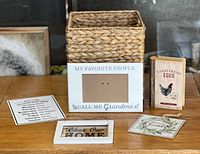 All items grouped: basket, photo frame, three plaques, block sign