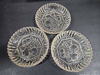 All three pressed glass dishes showing pattern and quantity
