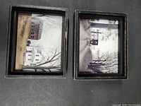 Front view of both framed prints showing images and frame style