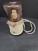 Chopper assembled showing base, bowl, lid and cord