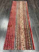 Full view of rug showing entire length and pattern