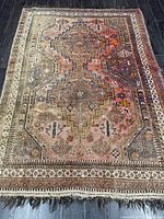 Full view of entire Shiraz rug showing overall pattern and fringes