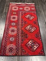 Full view of the Turkman rug showing entire pattern and size