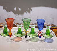Front view of all six goblets showing styles and colors