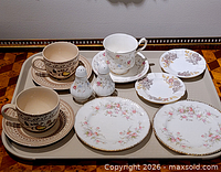 All 12 tea service pieces arranged on tray