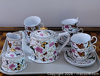 full tea service set displayed on tray