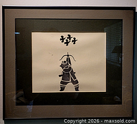Frontal view of framed artwork showing image, mats, frame