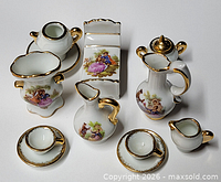 Full view of all ten miniature Limoges pieces