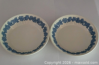 Two Wedgwood Queensware bowls side by side