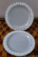 Front view of both plates showing border pattern and glaze