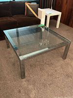 Overall view of chrome glass coffee table
