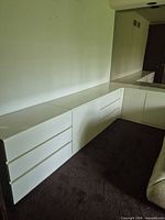 L-shape arrangement showing left side dresser units and corner