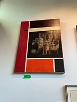 Full view of framed abstract acrylic painting hanging on wall