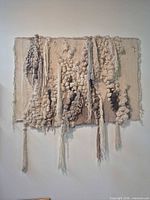 Front view of entire wool wall tapestry mounted on wall
