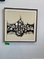 Front view of framed square relief painting