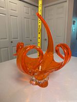 Front view showing freeform design, tape for height reference