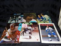 Six 1970s Vancouver Canucks NHL magazines arranged in two rows