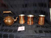 Full lot: teapot, two mugs, cream pitcher