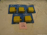 Five sealed Duncan pull-string music boxes on cards