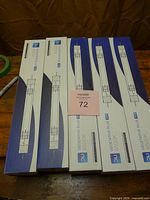 Five boxed DLI Vegetative Plus MH 1000W grow light bulbs
