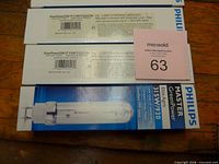 Three Philips Master GreenPower CDM-TP 315W lamp boxes showing model and wattage