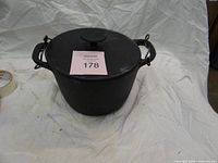 Dutch oven with lid attached