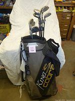 Full view of King Cobra golf bag with clubs inserted