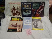 All six books front covers visible