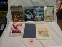 Group shot of all seven books laid out