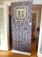 Full view of assembled Macseis banner on aluminum base