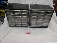 Both shrink-wrapped cabinets showing drawer layout