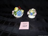Both porcelain posy bowls side by side showing overall size