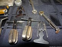 Group view showing adjustable reamers, folding tools, tamper, plus adjacent accessories