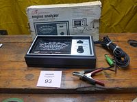 Full view of analyzer, test leads and box