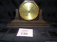 Front view of Taylor Stormoguide desk barometer on base