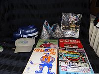 Full lot overview showing cap, foam Zamboni, four programs, two party hats