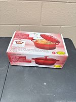 Front of sealed Ernesto Dutch oven retail box