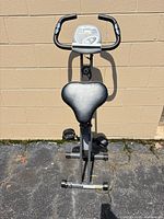 Front view of Stamina Muuv foldable exercise bike showing seat, frame and pedals