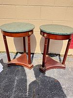 Front view of both Bombay Company accent tables