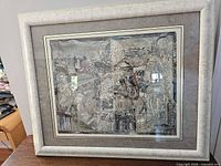 Front view of framed lithograph showing artwork, mat and frame
