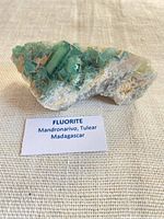 Fluorite specimen with origin label