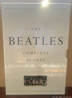Front of slipcased hardcover showing title and Beatles photo