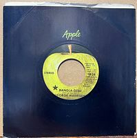Front view of record in black Apple sleeve showing A-side label with black star