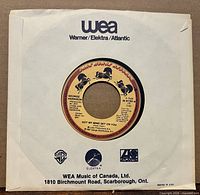 Record in generic WEA white sleeve, full view