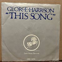 Front of grey picture sleeve with title and Dark Horse logo