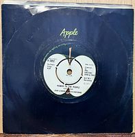 Front view of Apple company sleeve showing record with label text “Power To The People” and catalog number R 5892 visible
