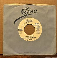 Front view of record in blue Epic sleeve