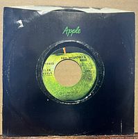 Front view of Apple company sleeve showing center cutout with Apple label of record visible